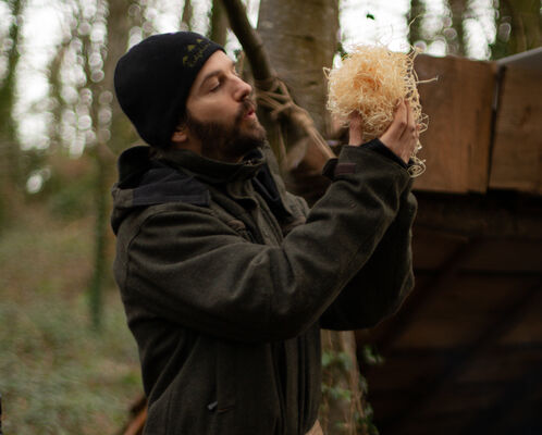 Rob making a fire at bushcamp